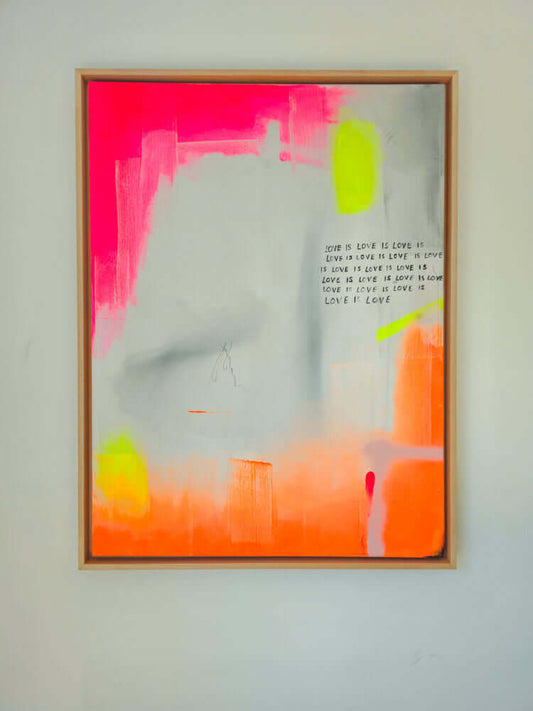 Original artwork 'Love is Love' by Studio Froilein Juno, mixed media on canvas, vibrant pink and orange hues, framed.